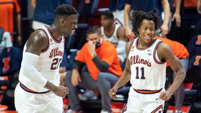 Illinois' Kofi Cockburn and Ayo Dosunmu celebrate while playing against Purdue on Jan. 2.